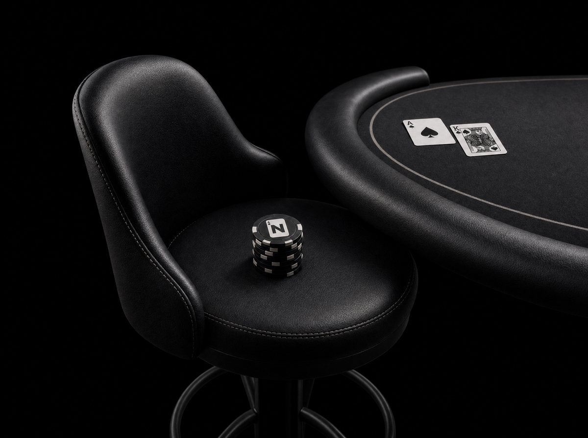 A black leather stool at a Natural table with a stack of N chips on the seat